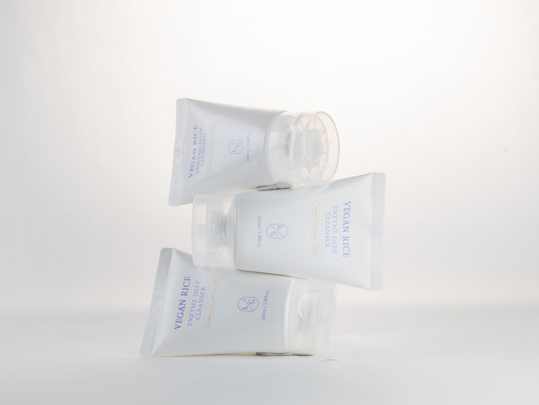 Three vegan rice enzyme deep cleansers stacked on a white background