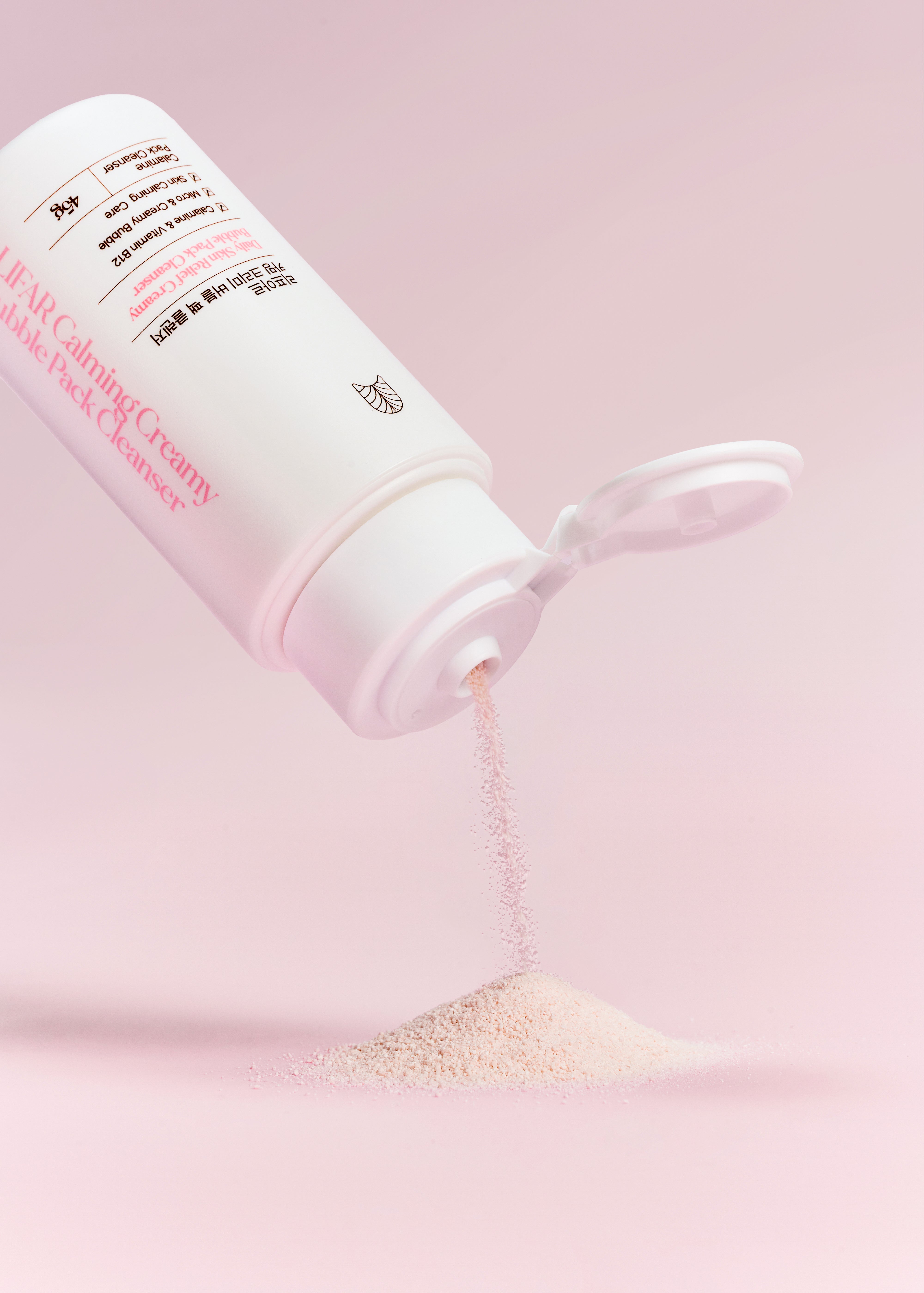 Cosmetic product with a pink background
